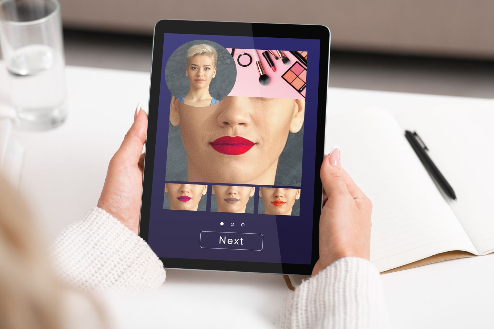 A woman using a makeup simulation application on a tablet